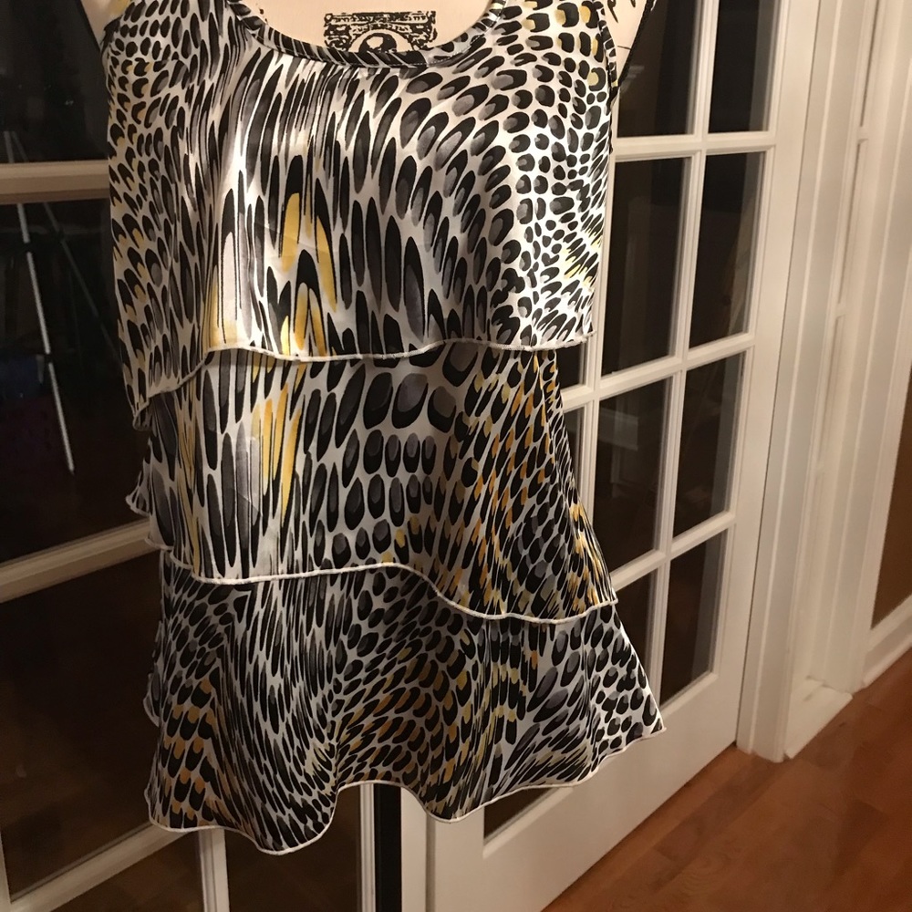 Super cute blouse, worn once. Jr’s size L